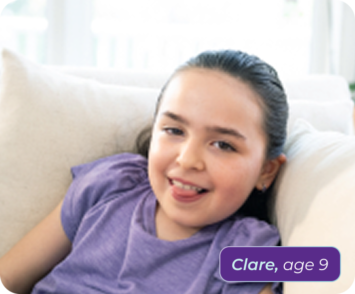 Clare, age 9, living with Rett syndrome, with her mom in the pool
