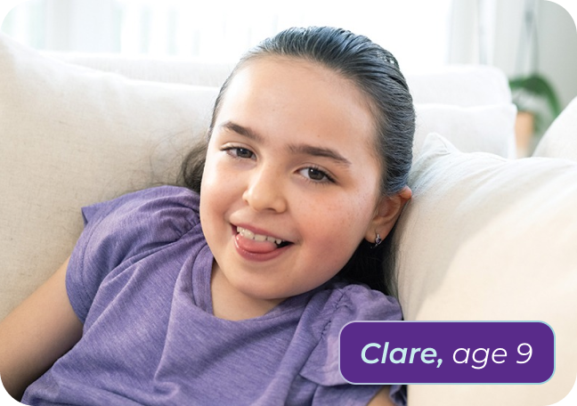 Clare, age 9, living with Rett syndrome, with her mom in the pool