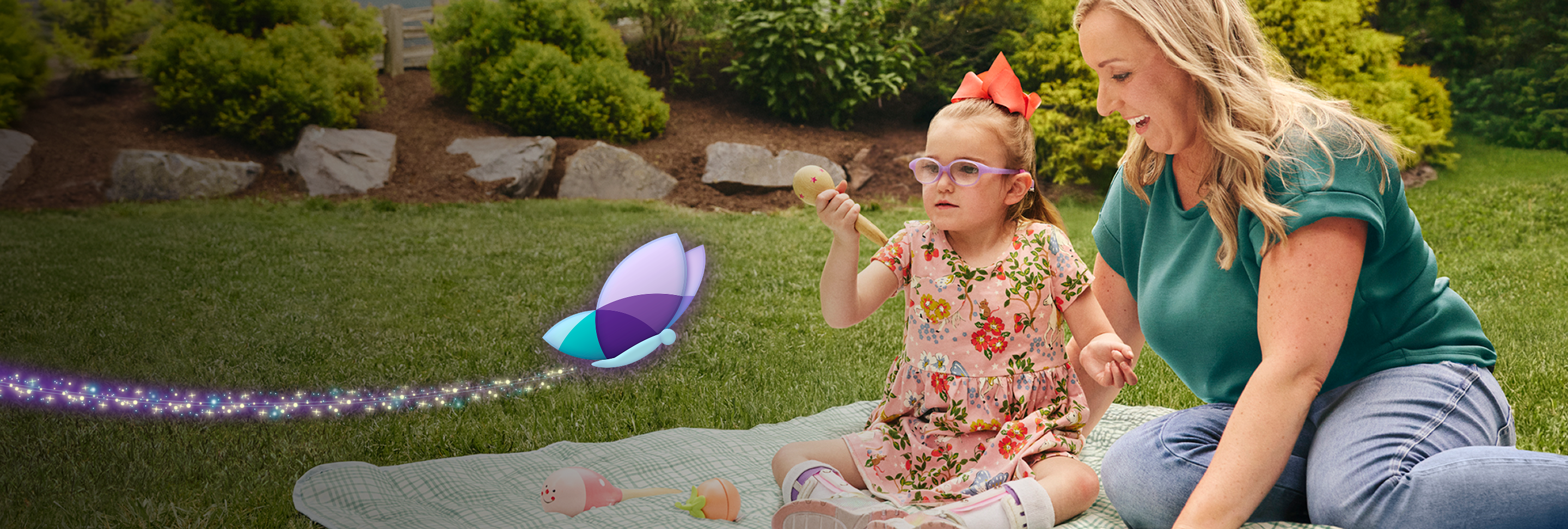 Madelyn, age 5, living with Rett syndrome, holding an ice cream cone. The light makes a circle around Madelyn.